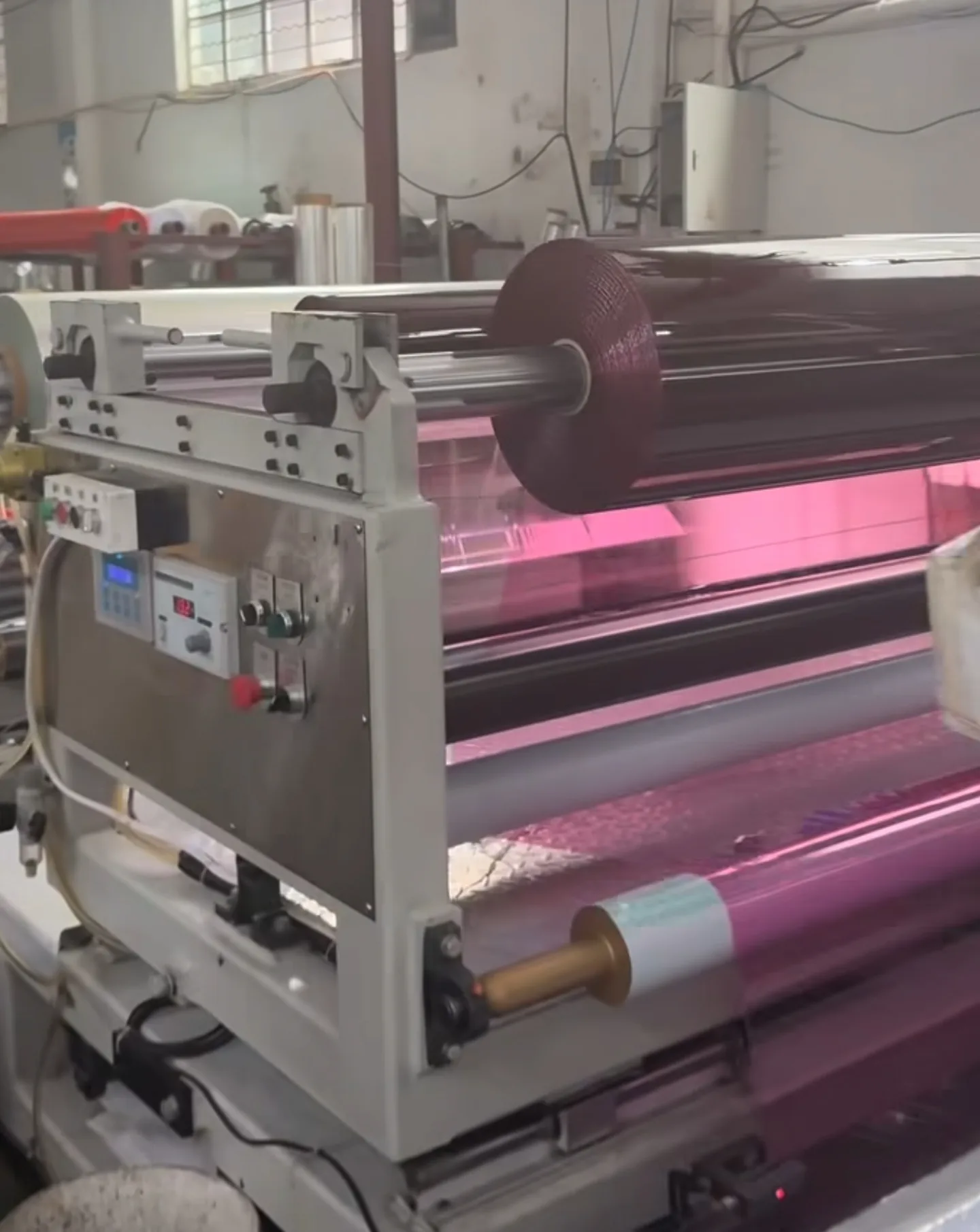 Pink chrome vinyl wrap film production machine running in China factory