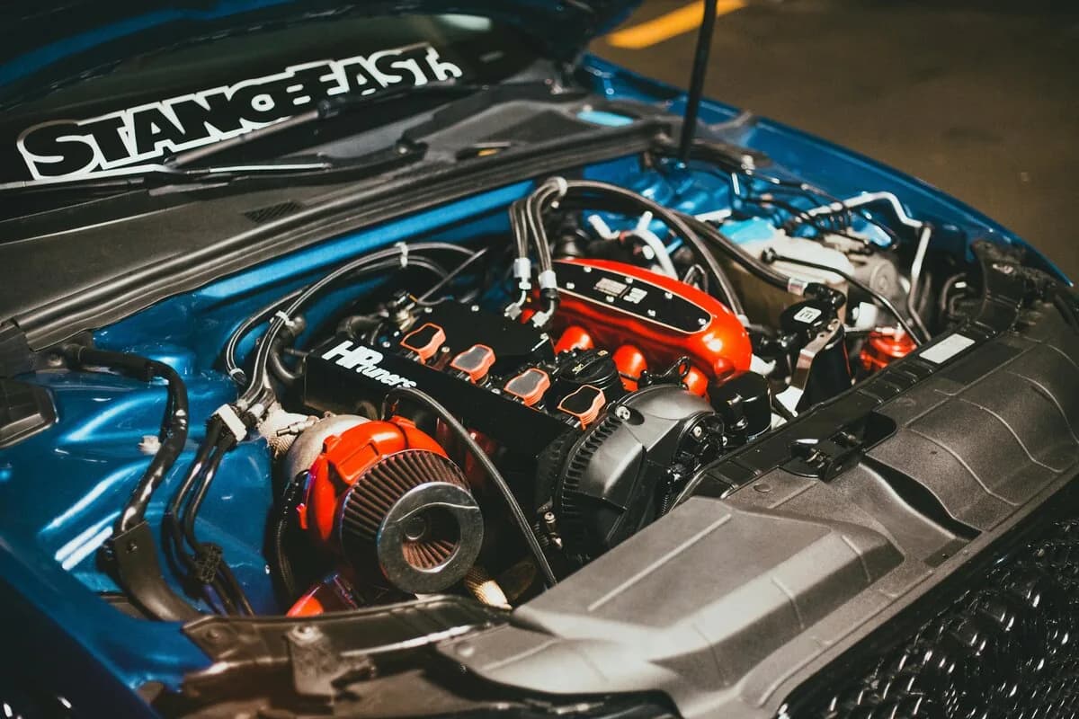Clean performance engine bay showing turbocharged sport engine ready for ECU tuning