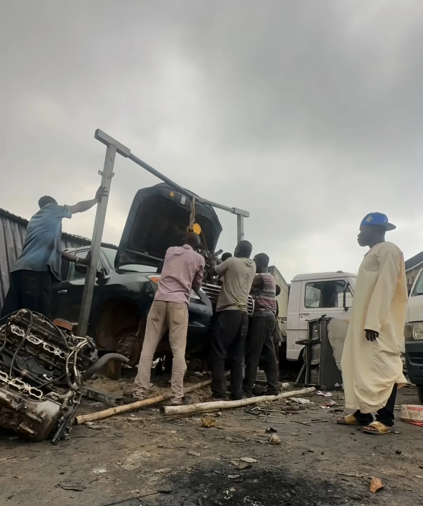 Mohammed Lexus team working on LX570 engine during facelift restoration process Lagos