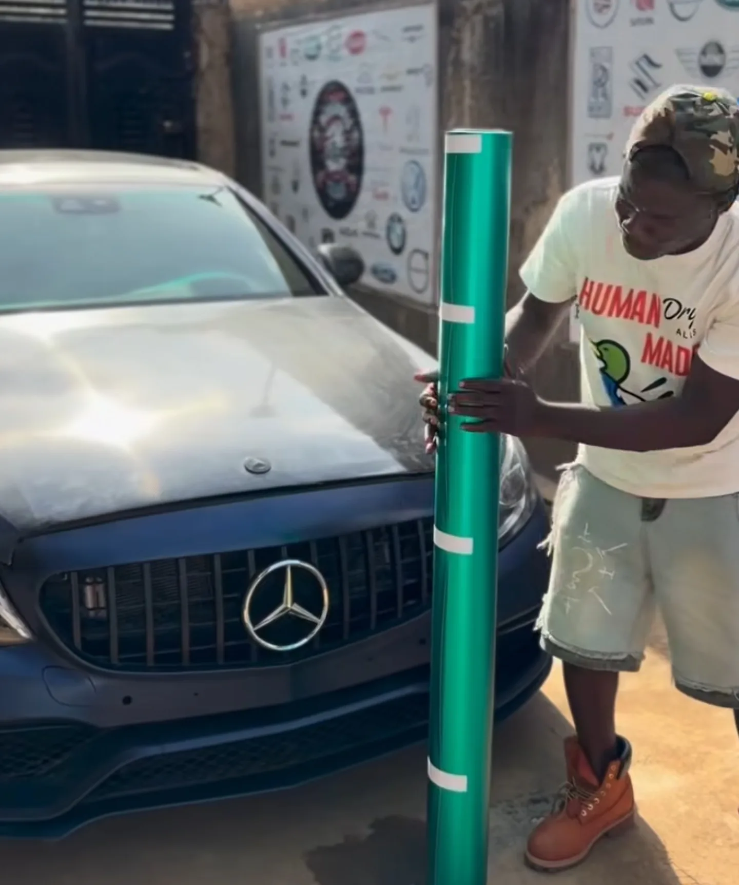Satin aqua green vinyl roll colour reveal before wrap Mercedes C43 Mohammed Lexus