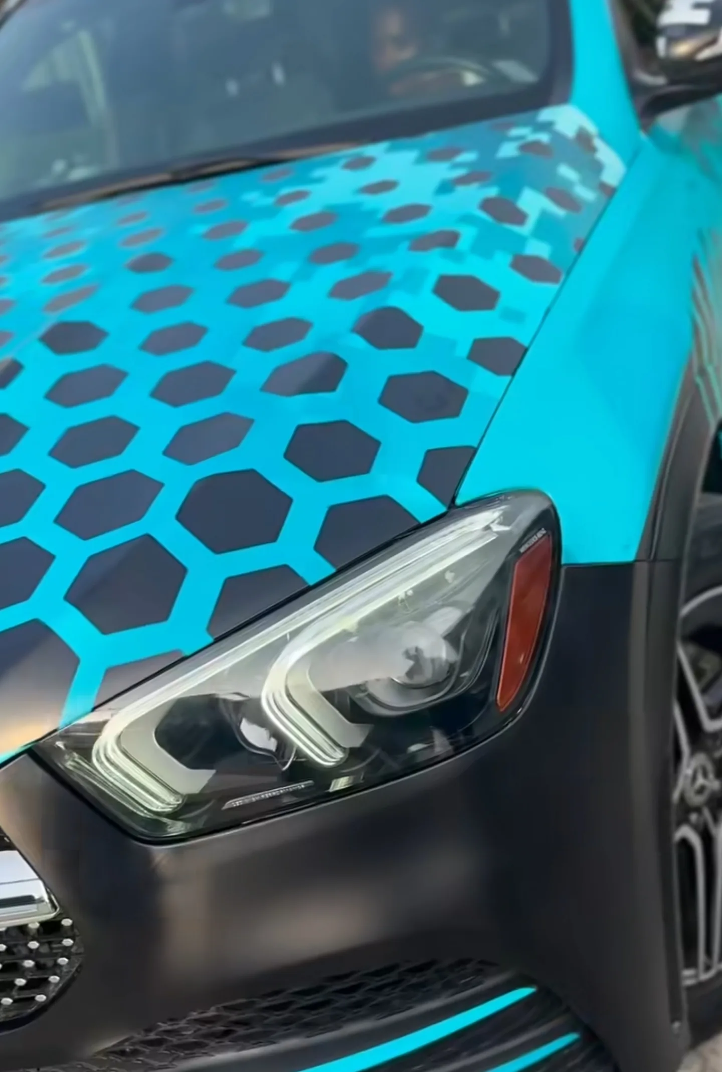 Mercedes GLE custom honeycomb teal black wrap bonnet headlight close-up detail