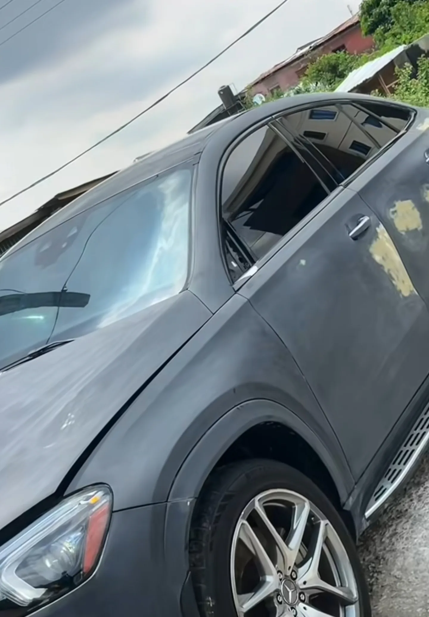 Mercedes GLE 53 side profile in grey during colour change transformation at Mohammed Lexus